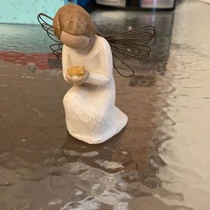 Willow tree girl holding a chick